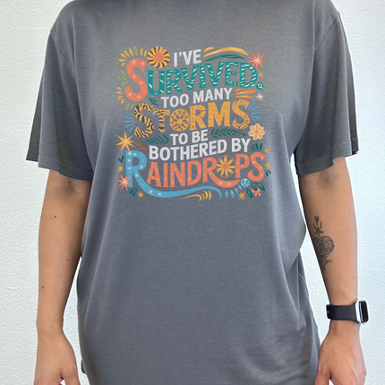 I've Survived Too Many Storms to Be Both Unisex Bamboo/Cotton Graphic T-Shirt