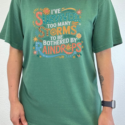 I've Survived Too Many Storms to Be Both Unisex Bamboo/Cotton Graphic T-Shirt