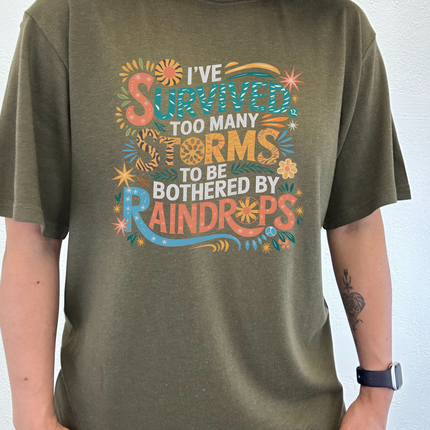 I've Survived Too Many Storms to Be Both Unisex Bamboo/Cotton Graphic T-Shirt